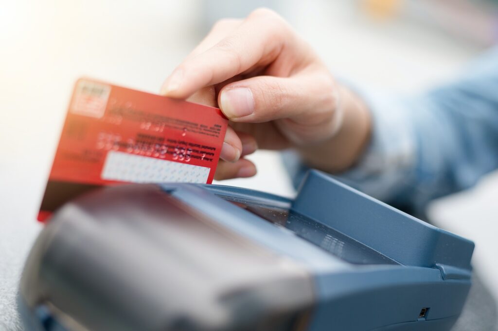 Debit card swiping on card reader device